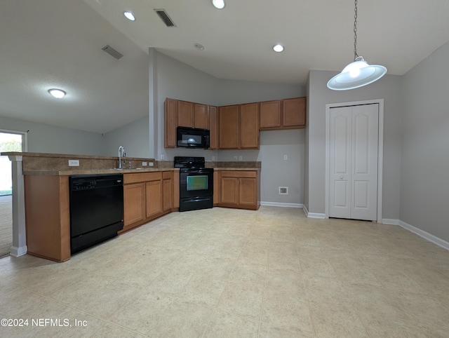 kitchen with black appliances, sink, hanging light fixtures, vaulted ceiling, and kitchen peninsula