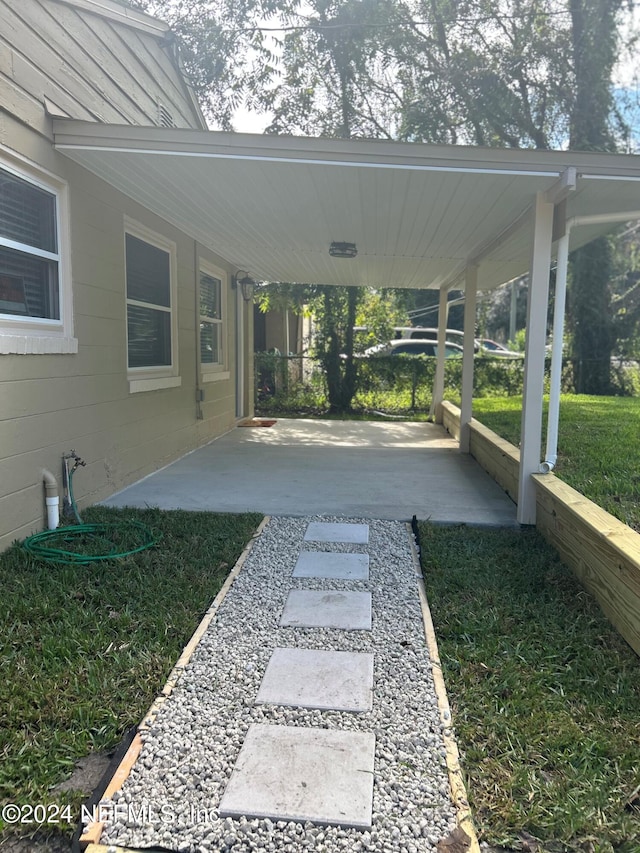 view of yard featuring a carport