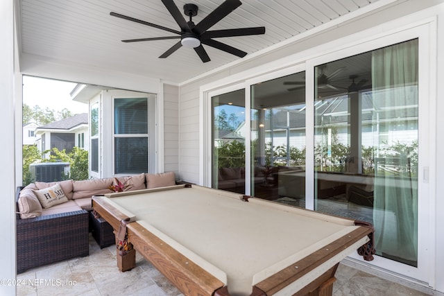 view of patio with ceiling fan and an outdoor hangout area