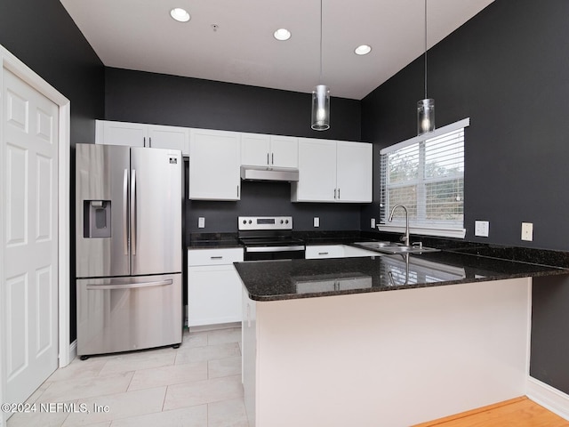 kitchen with kitchen peninsula, sink, decorative light fixtures, and appliances with stainless steel finishes