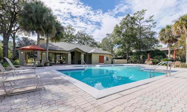 view of pool with a patio