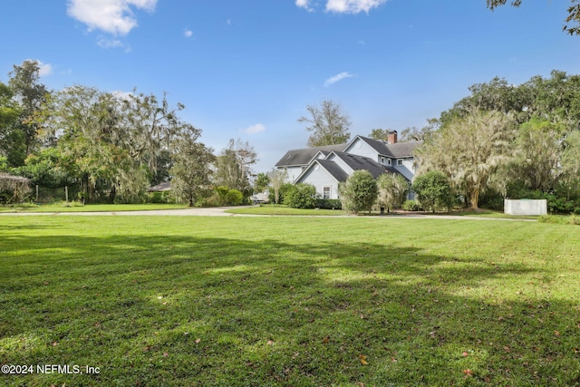 exterior space with a front lawn