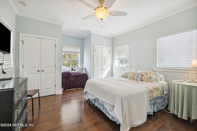 bedroom featuring ceiling fan, dark hardwood / wood-style floors, and ornamental molding