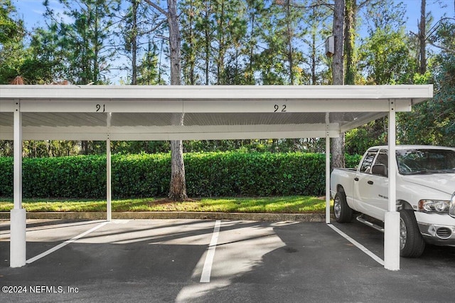 view of car parking with a carport