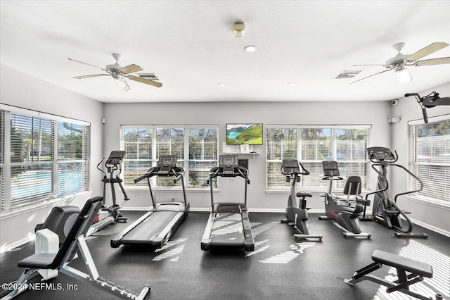 exercise room featuring ceiling fan