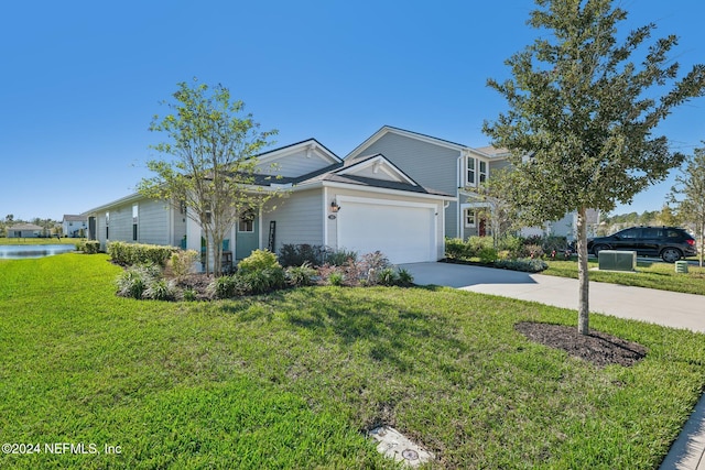 view of front facade with a front lawn and a garage