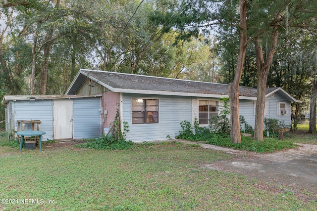 exterior space featuring a front yard