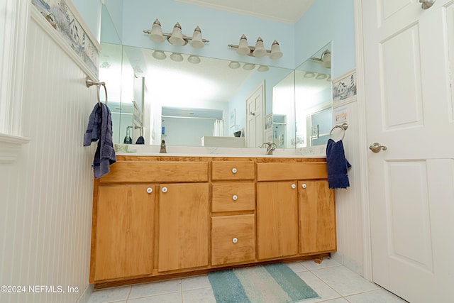 bathroom featuring vanity and tile patterned flooring