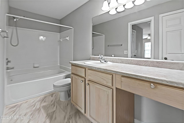 full bathroom featuring toilet, shower / bathing tub combination, and vanity