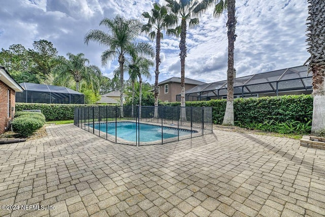 view of swimming pool featuring a patio