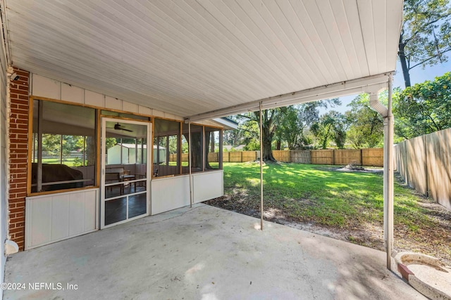 view of patio / terrace featuring a sunroom