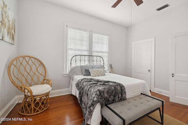 bedroom featuring dark wood-type flooring and ceiling fan