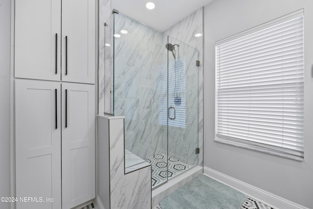 bathroom with an enclosed shower