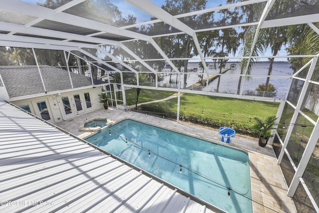 view of pool featuring an in ground hot tub, french doors, glass enclosure, and a patio area