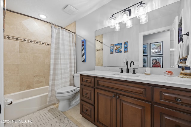 full bathroom featuring tile patterned floors, vanity, toilet, and shower / bathtub combination with curtain