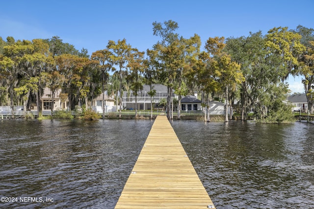 view of dock with a water view