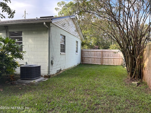 view of yard featuring central AC