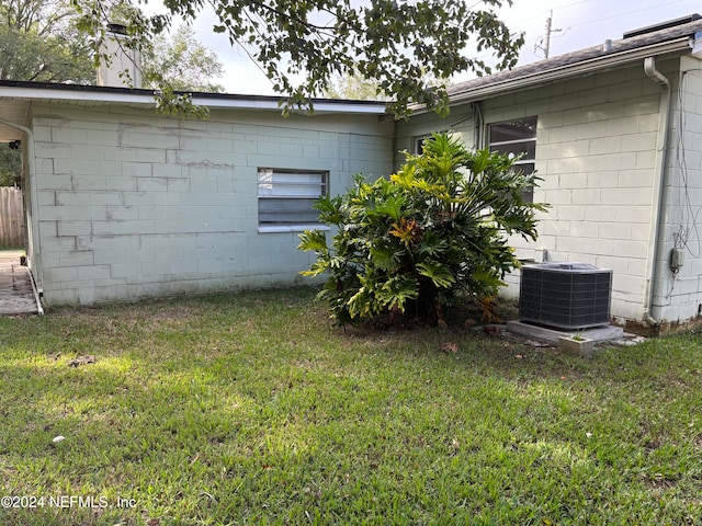 view of yard featuring central AC