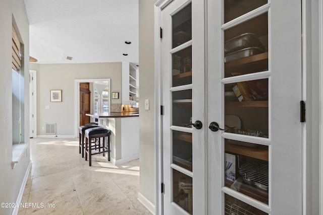 corridor with french doors