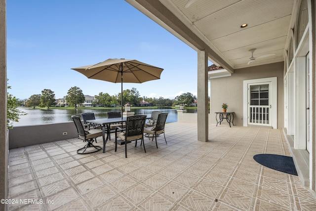 view of patio / terrace featuring a water view