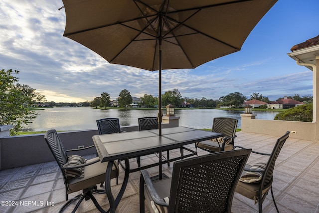 view of patio / terrace featuring a water view