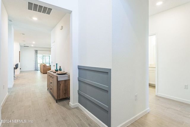 hall featuring light hardwood / wood-style floors