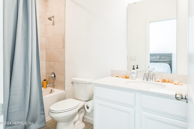 full bathroom featuring toilet, shower / tub combo with curtain, vanity, and hardwood / wood-style flooring