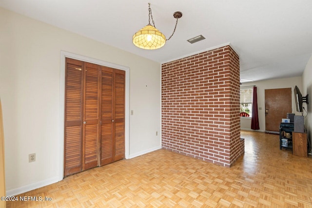 interior space with light parquet flooring