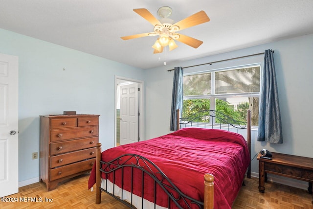 bedroom featuring parquet floors and ceiling fan