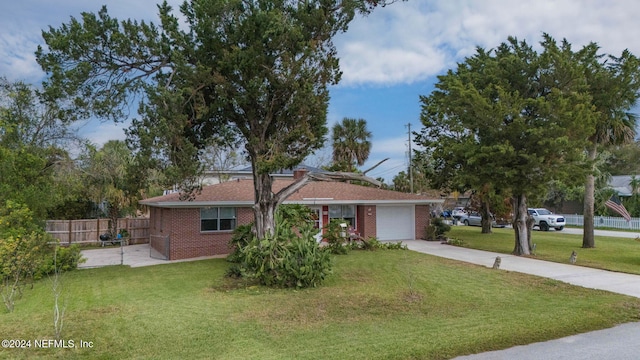 ranch-style house with a garage and a front yard