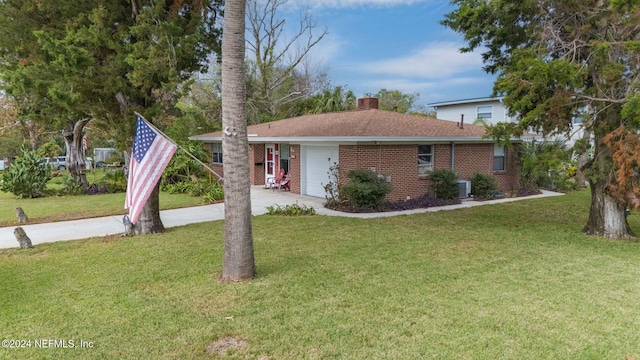 ranch-style house featuring a garage, cooling unit, and a front lawn