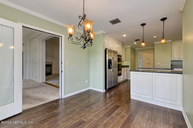 kitchen with hanging light fixtures, dark colored carpet, stainless steel refrigerator with ice dispenser, crown molding, and white cabinets