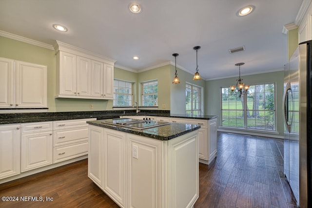 kitchen with stainless steel refrigerator, dark wood-type flooring, a kitchen island, black electric stovetop, and white cabinets