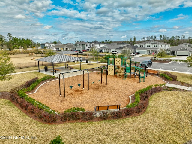 view of playground with a yard