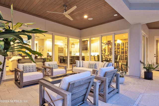 view of patio / terrace with ceiling fan and an outdoor hangout area