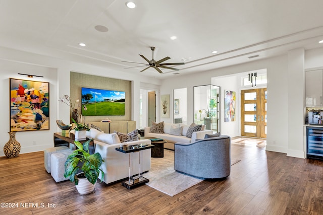 living room with hardwood / wood-style floors, ceiling fan, wine cooler, and french doors