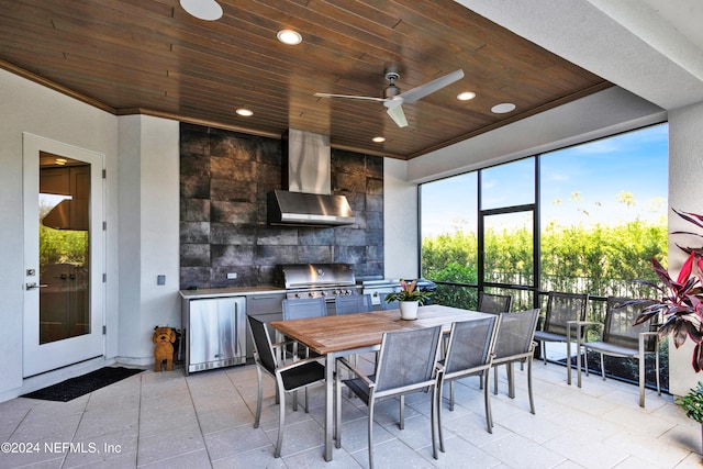 interior space featuring ceiling fan and area for grilling