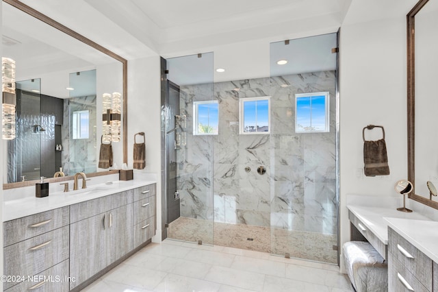 bathroom featuring vanity and an enclosed shower