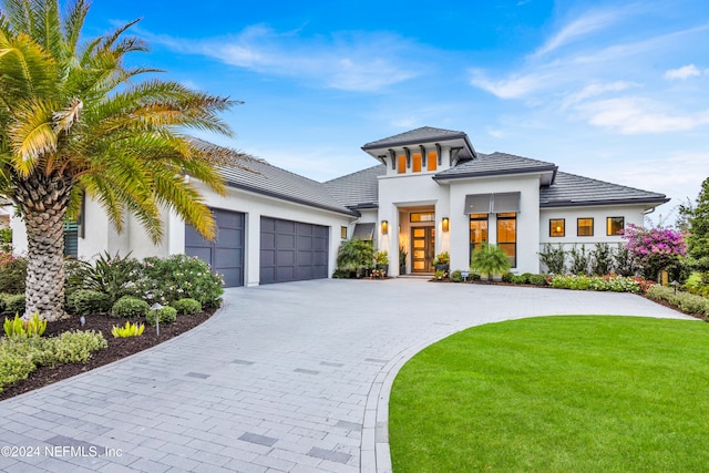 view of front of home featuring a garage and french doors