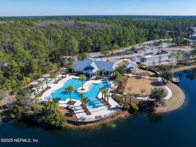 birds eye view of property featuring a water view