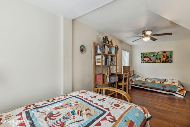 bedroom with ceiling fan and dark hardwood / wood-style flooring