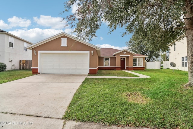 ranch-style house with a garage and a front yard