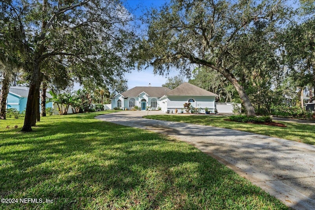 view of front of home with a front lawn