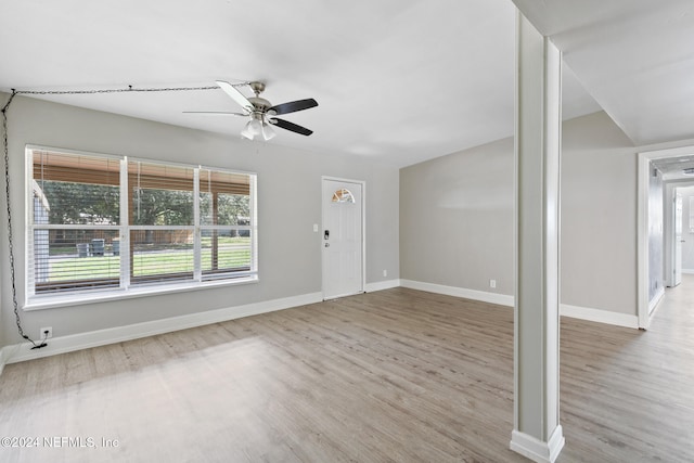 interior space with light hardwood / wood-style floors, ceiling fan, and plenty of natural light