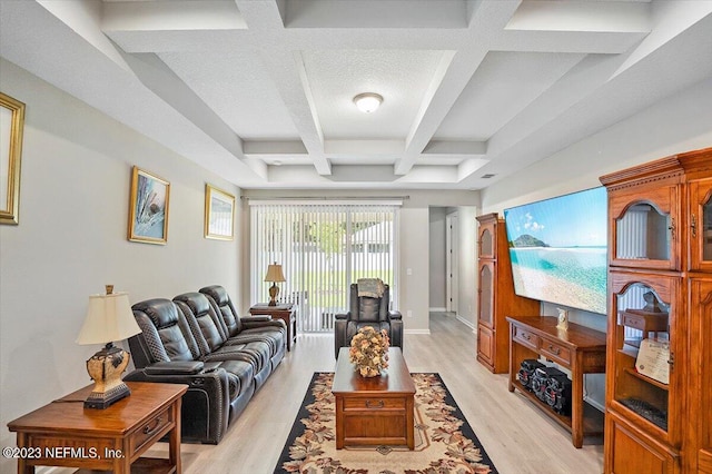 living room with light wood-type flooring, beamed ceiling, and coffered ceiling