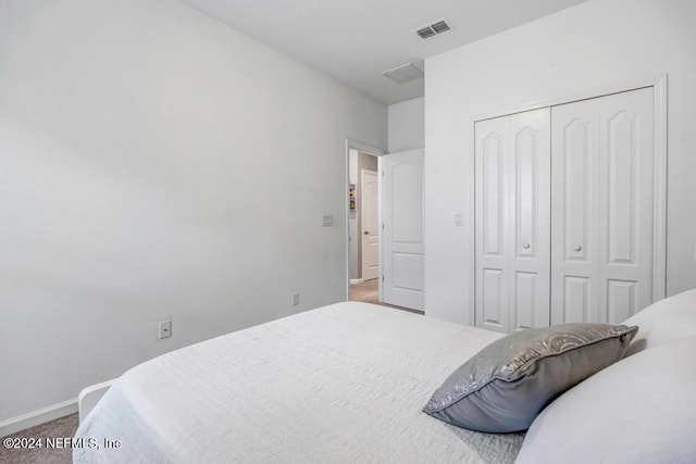 130 Wayfare Ln, Jacksonville, FL 32081 - bedroom featuring carpet floors, a closet, and baseboards