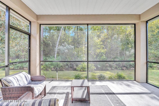 sunroom / solarium featuring plenty of natural light