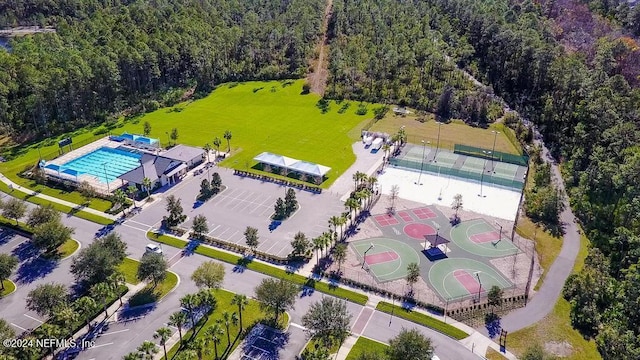 130 Wayfare Ln, Jacksonville, FL 32081 - aerial view of a pool area and a heavily wooded area