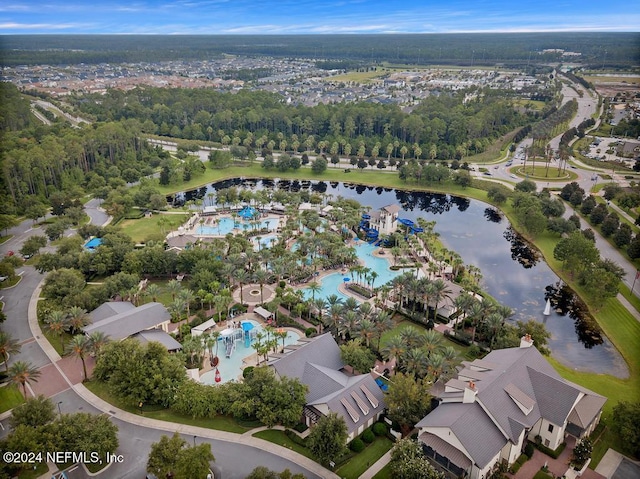 birds eye view of property featuring a water view