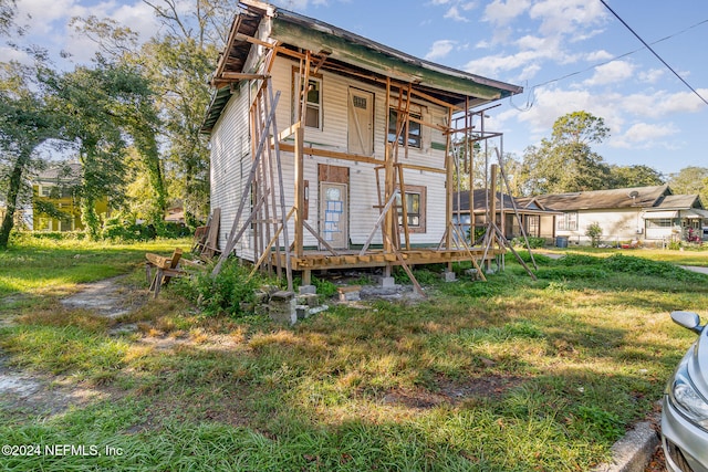 exterior space with a front lawn